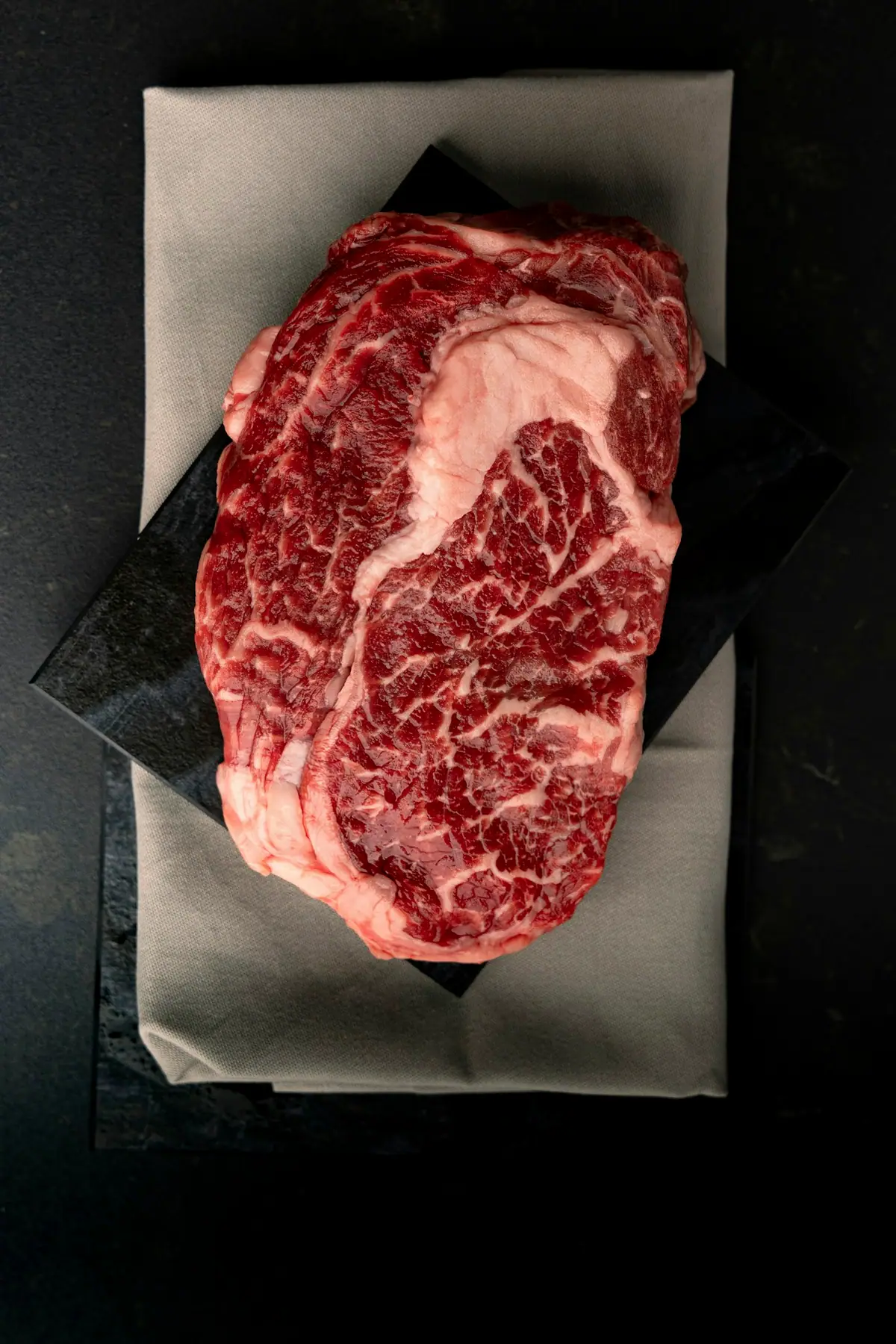 Marbled raw beef (placeholder photograph)